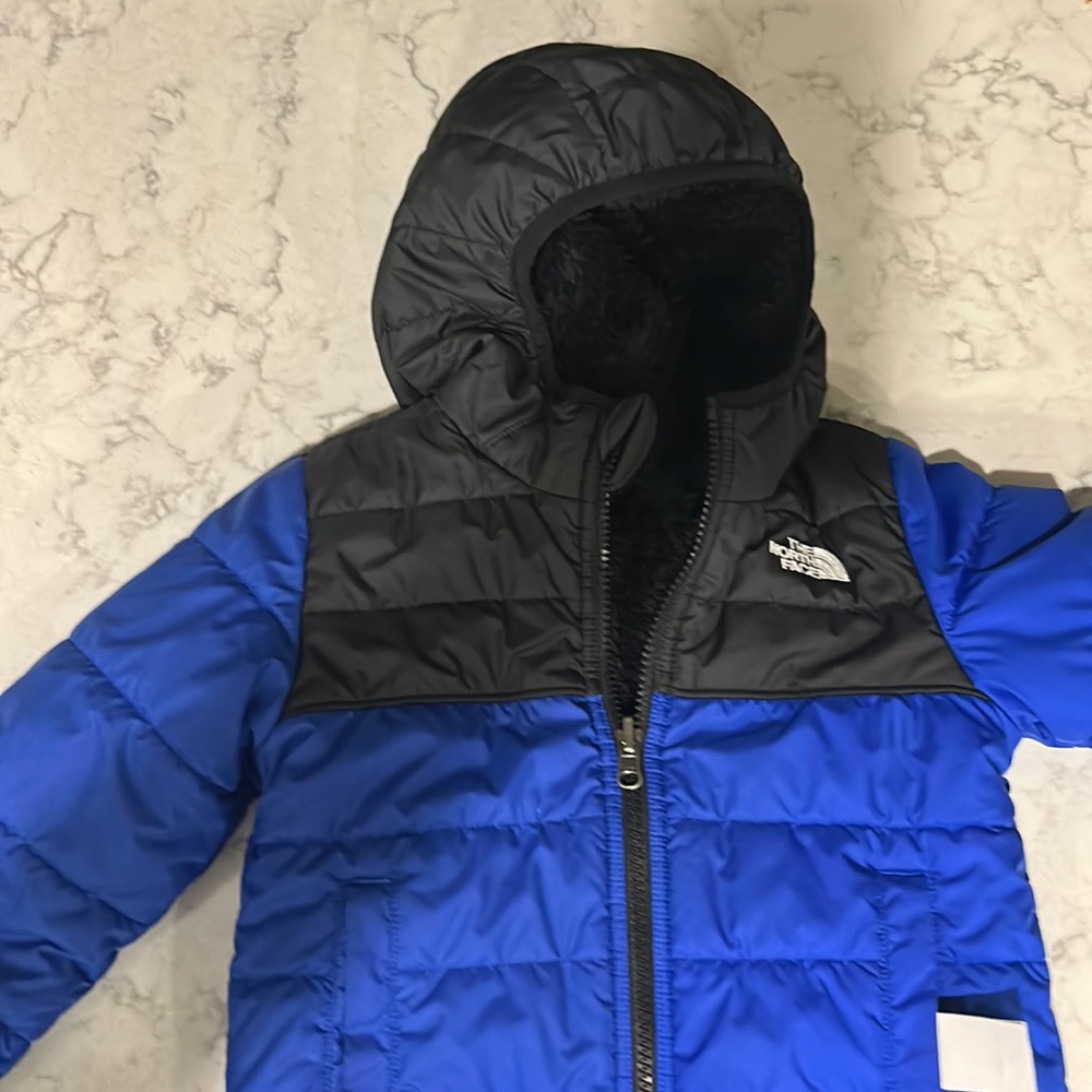 The North Face Boys Size 5T/5B Royal blue and black puffer jacket Reversible